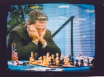 Garry Kasparov focuses intensely on his position in Game 6 of the Deep Blue vs Kasparov match in Philadelphia, Pennsylvania